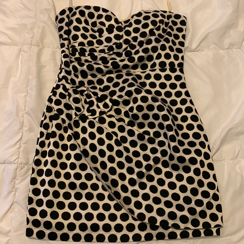 Polka dot formal dress. Asymmetrical bottom